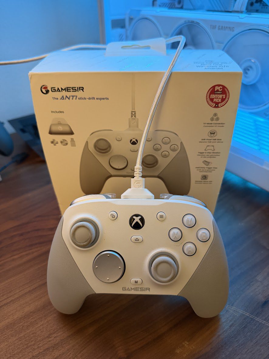GameSir G7 Pro Tri-Mode white controller front view with Xbox buttons and TMR sticks shown against original box and PC gaming setup